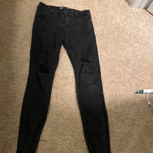 Black ripped skinny jeans